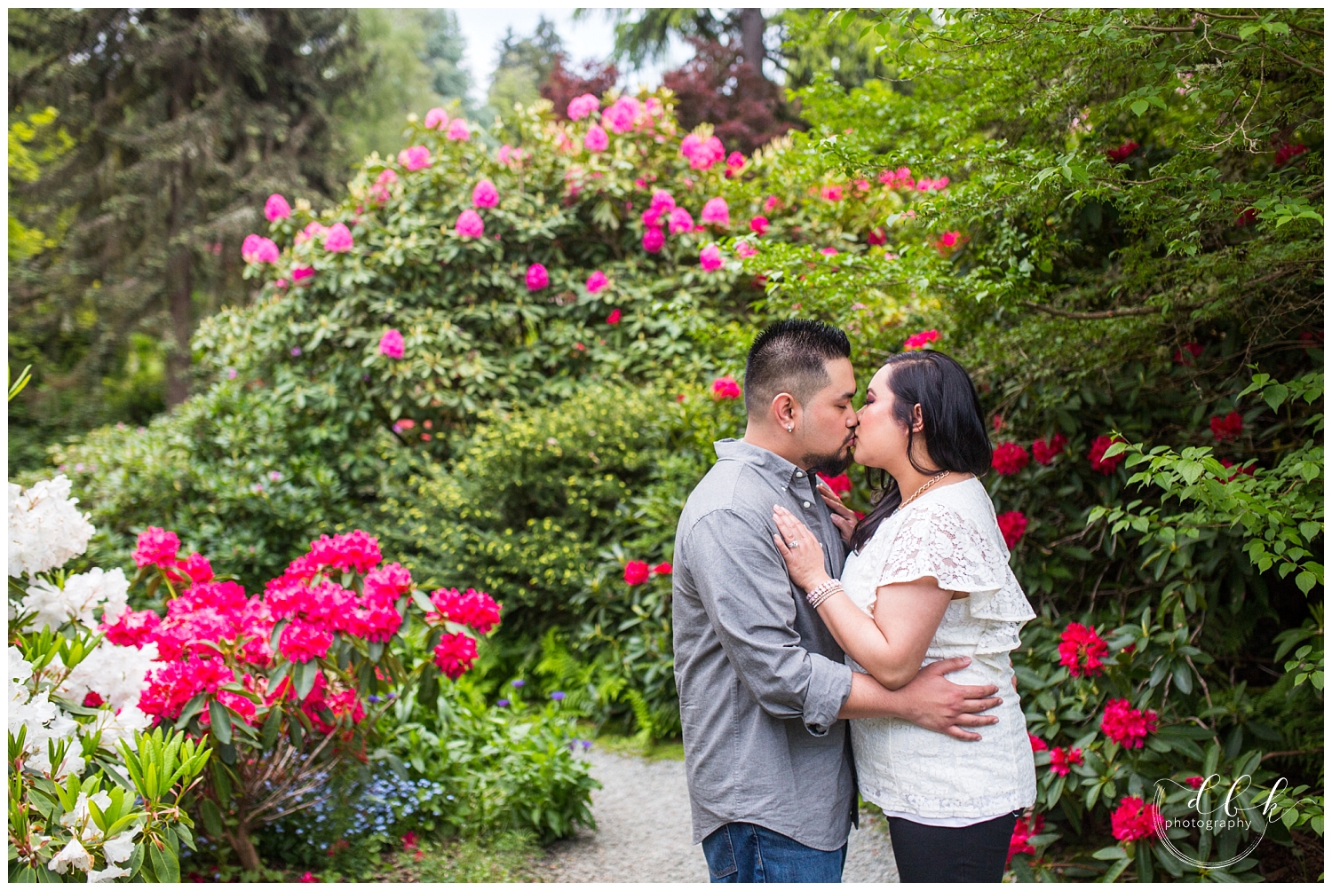 kissing couple in Japanese gardens of Kubota Garden, Seattle