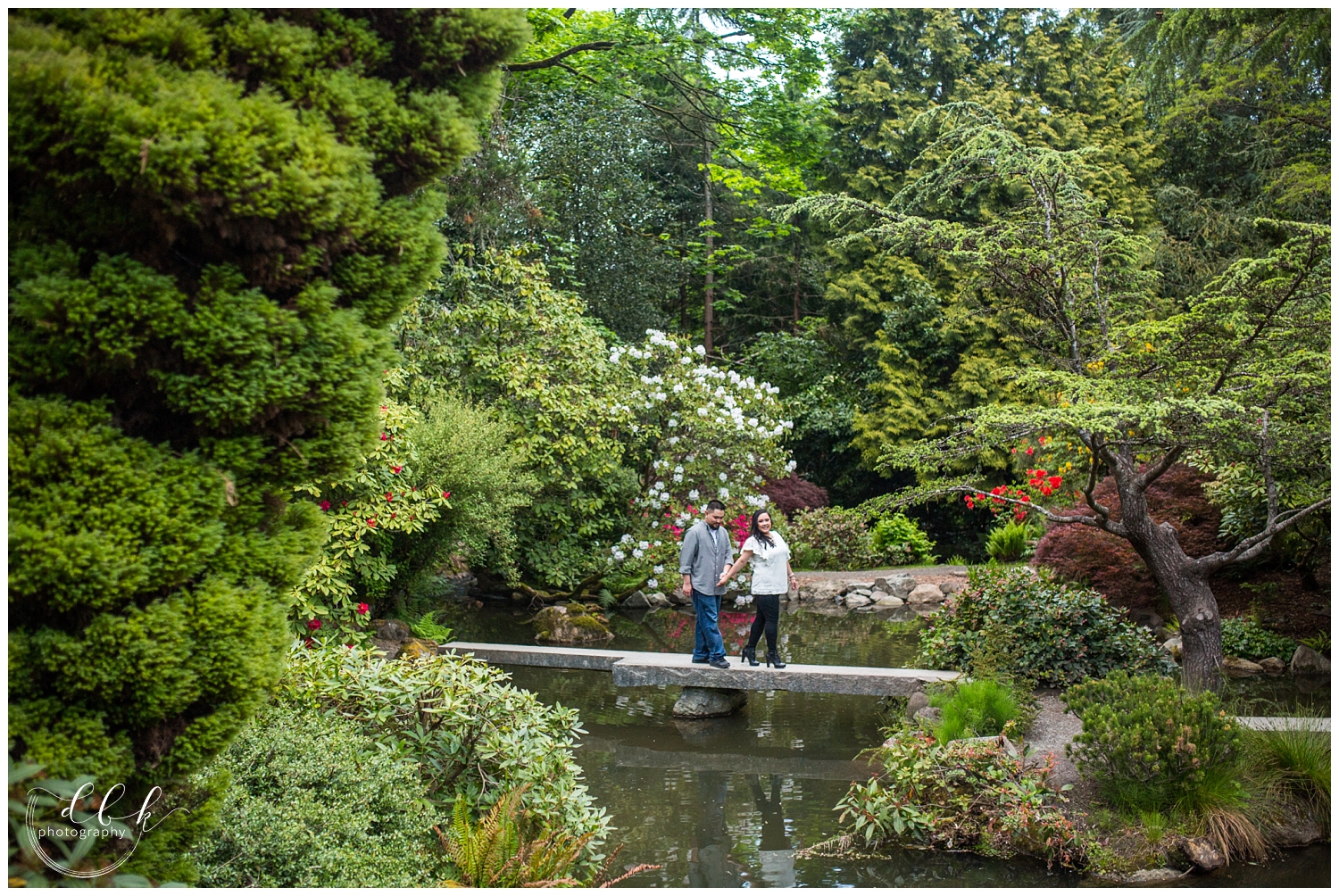 couple walking through the Japanese garden at Kubota Garden in Seattle