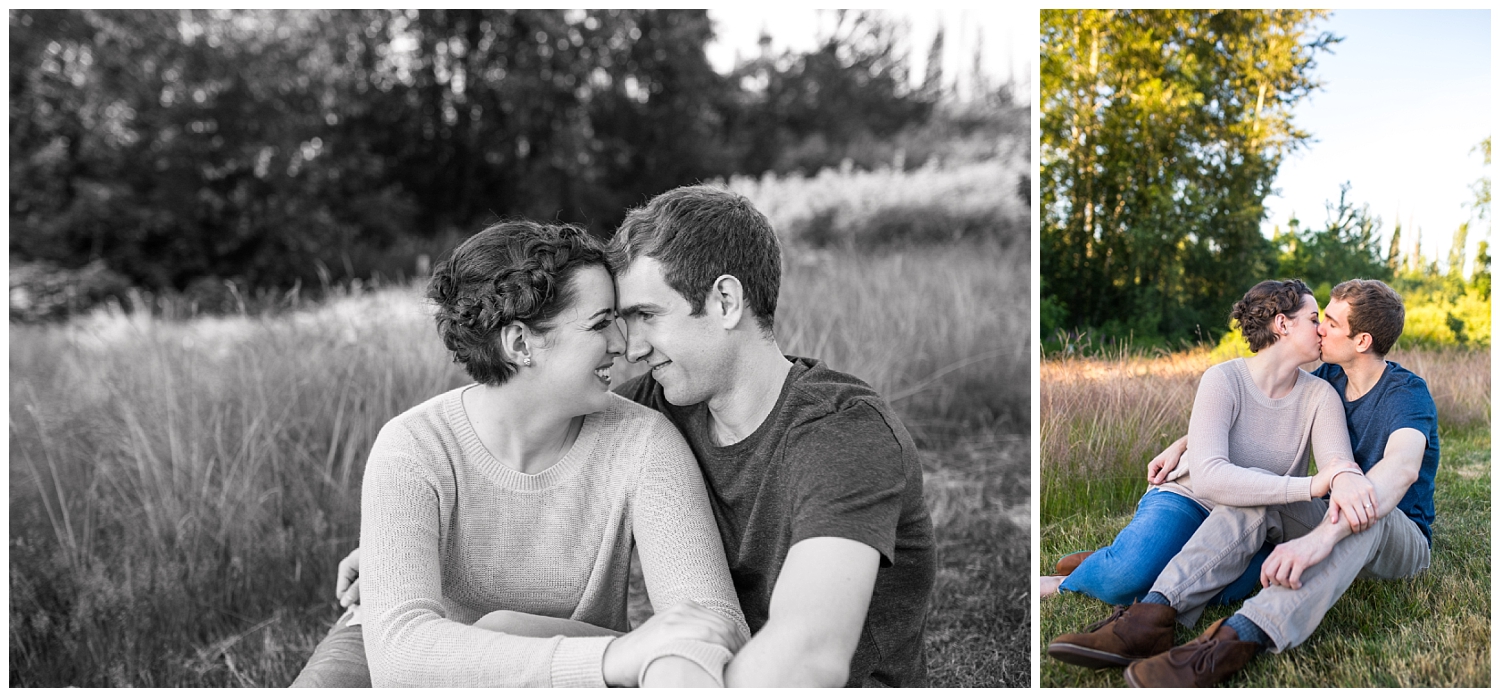 couple cuddling in tall grass for engagement pictures at Juanita Bay Park