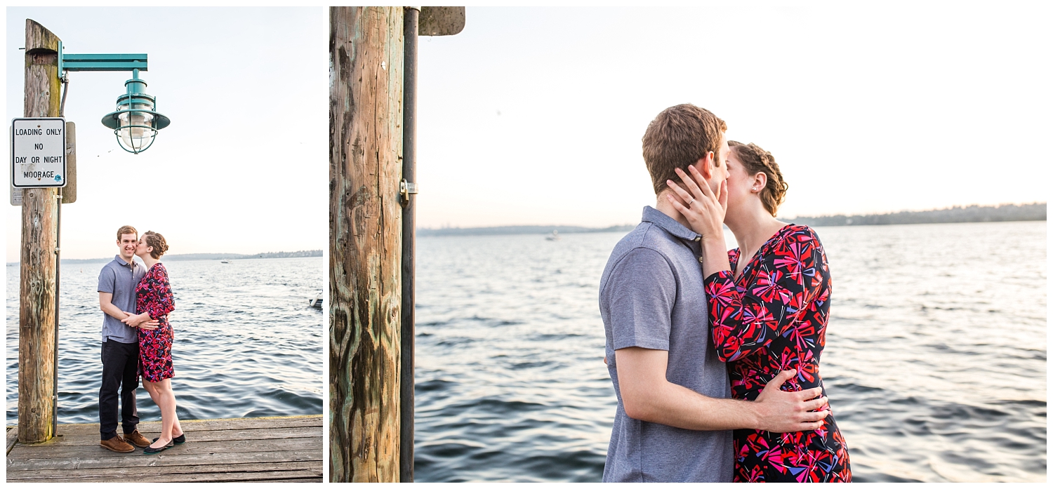 future bride kisses her future groom under lamp post at Kirkland Marina