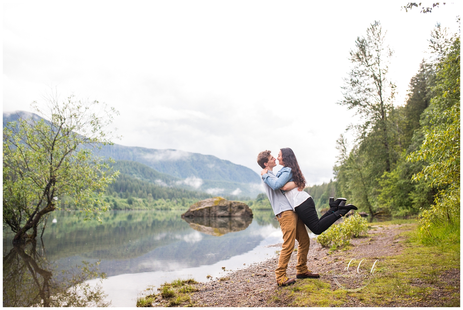 guy picking up his fiance beside Rattlesnake Lake in North Bend
