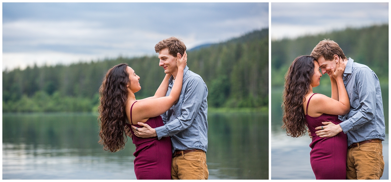 couple embracing at Rattlesnake Lake amid moody skies