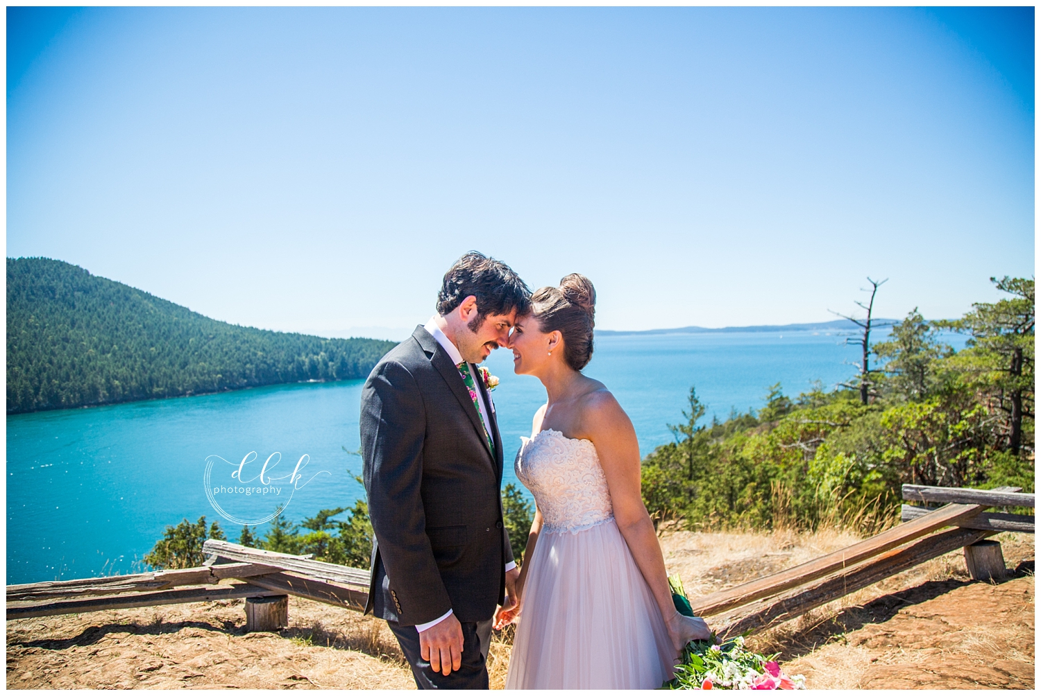 bride and groom touching foreheads together at Washington Park in Anacortes