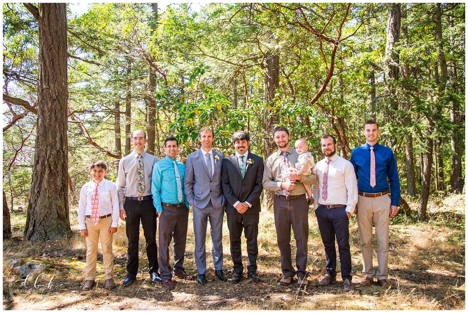 groomsmen facing the camera in a forest for Anacortes wedding portraits at Washington Park