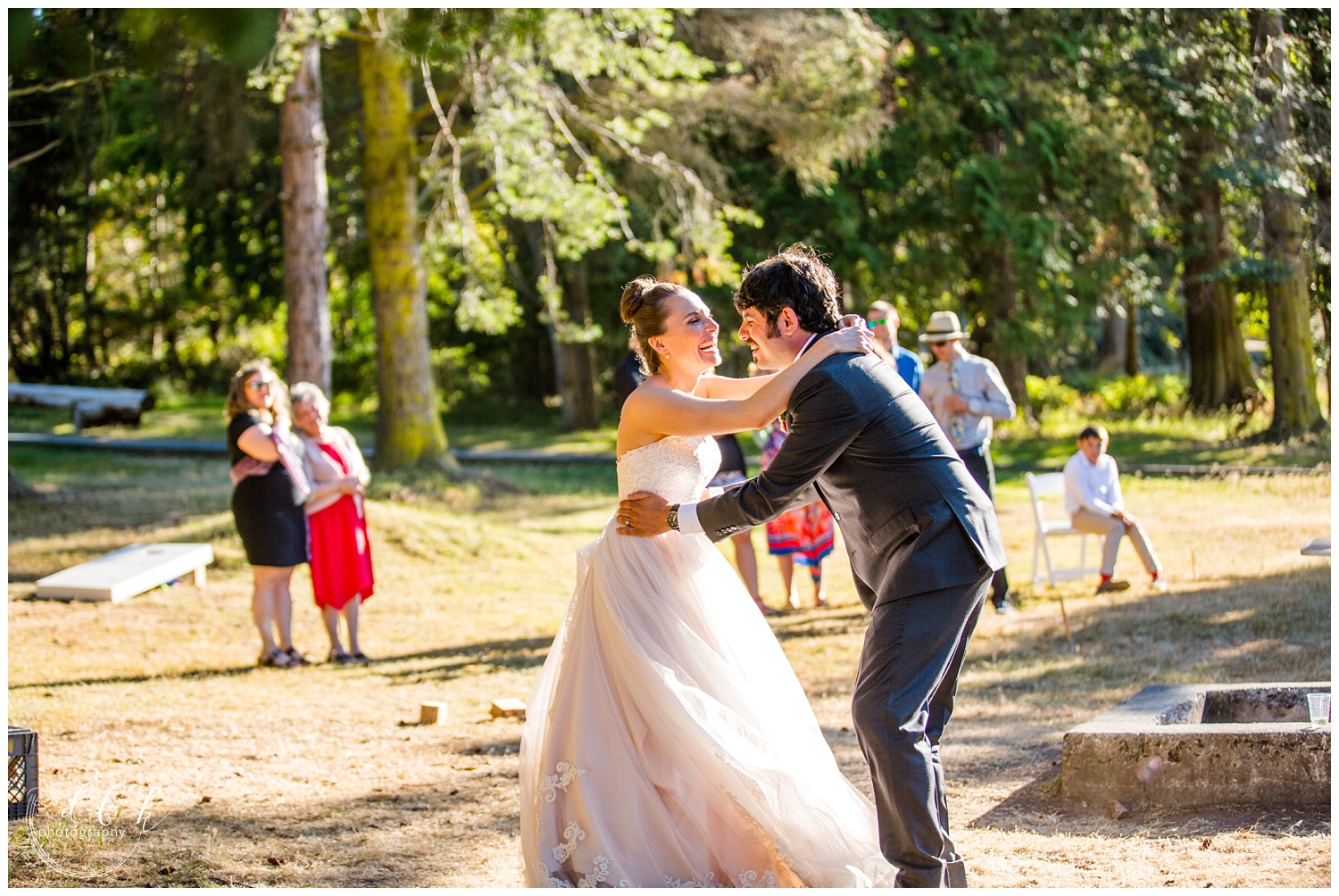 bride and groom get silly during their first dance at wedding in Washington Park, Anacortes