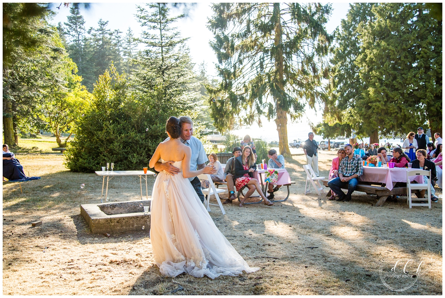 bride dances with her father during wedding reception at Washington Park, Anacortes