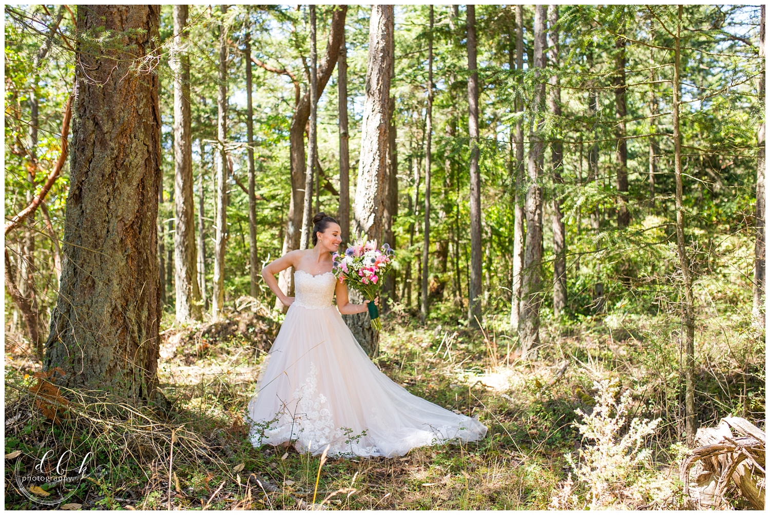 bridal portrait in forest with wildflower bouquet at Washington Park in Anacortes