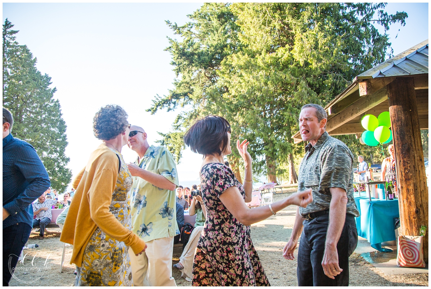 guests dancing at Anacortes wedding reception at Washington Park picnic area in Anacortes, Washington