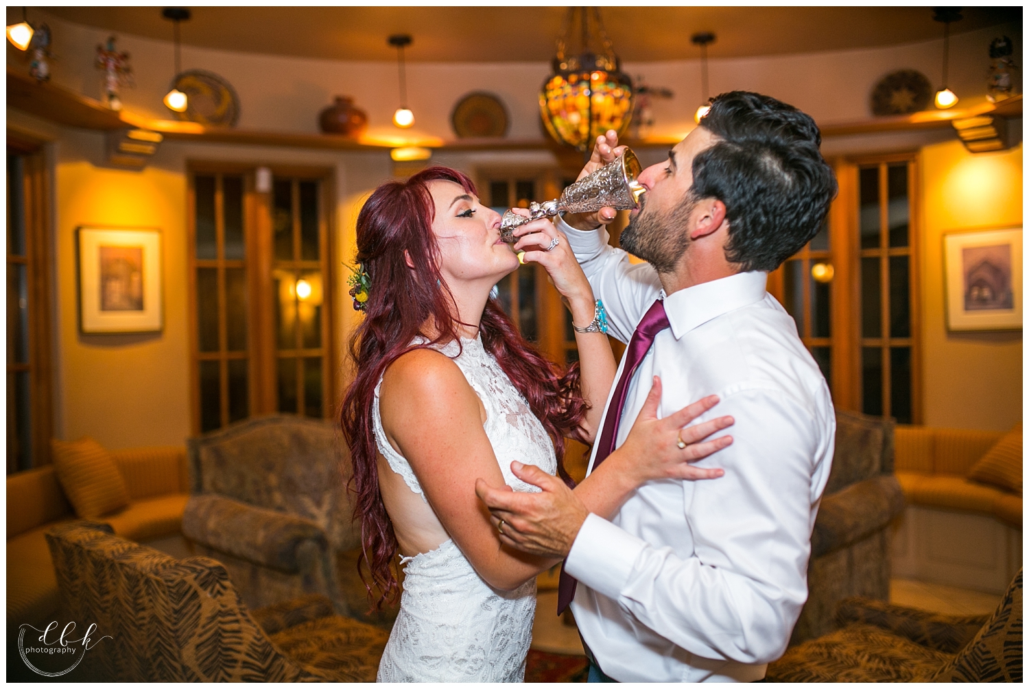 bride and groom sharing a drink at Casa Rondena Winery wedding