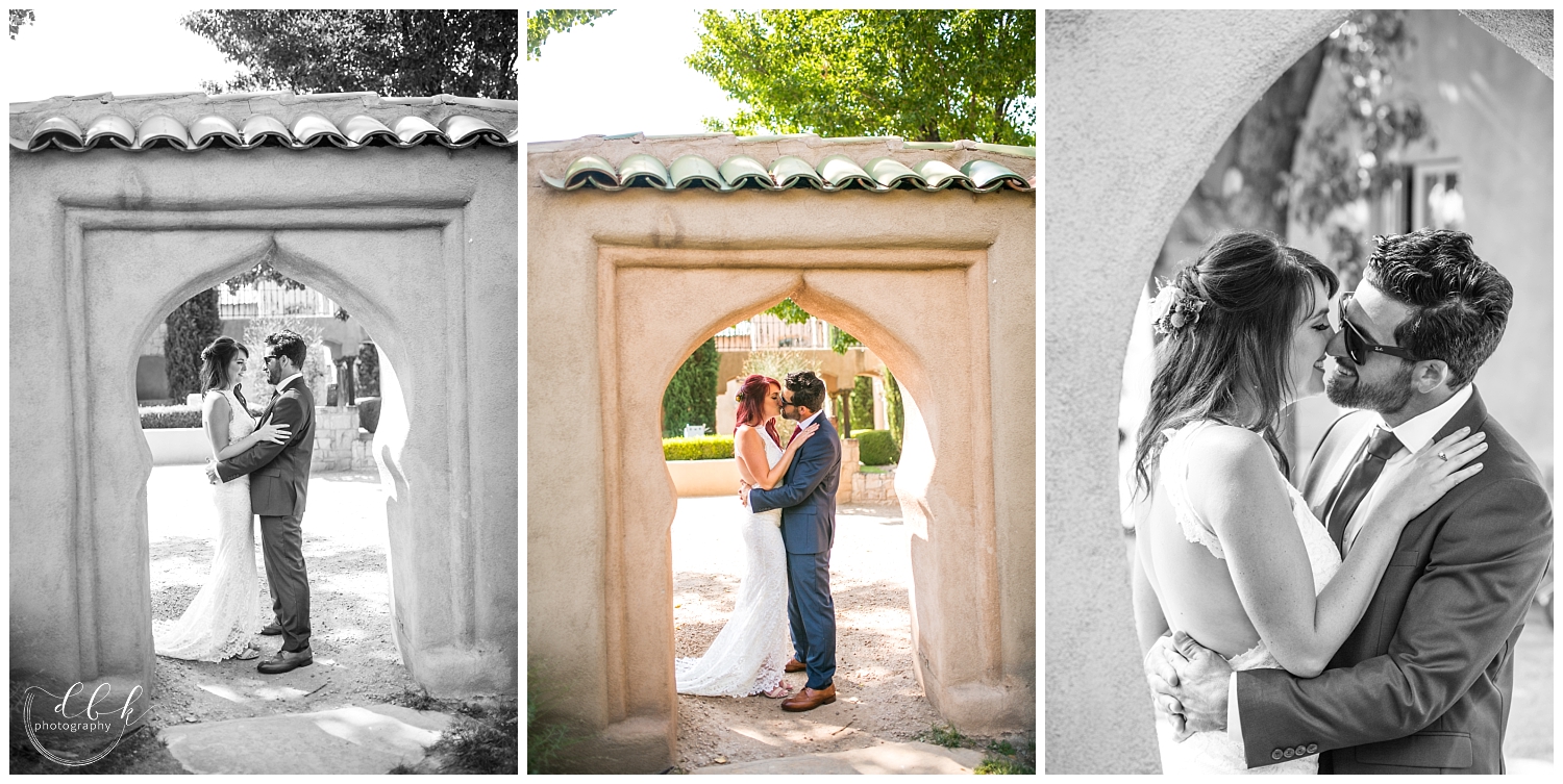 bride and groom stand facing each other under archway at Casa Rondena Winery