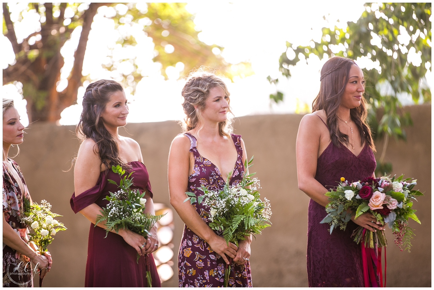 bridesmaids in maroon dresses at wedding ceremony in Albuquerque, New Mexico