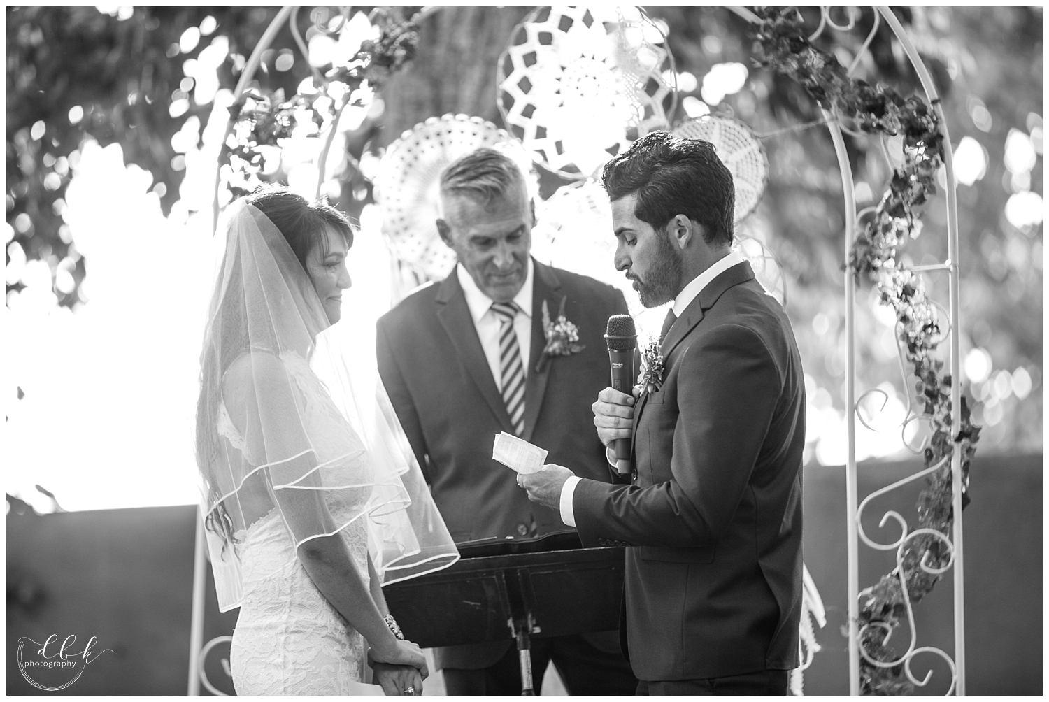 close up of bride and groom exchanging vows at Casa Rondena Winery wedding in Albuquerque, New Mexico