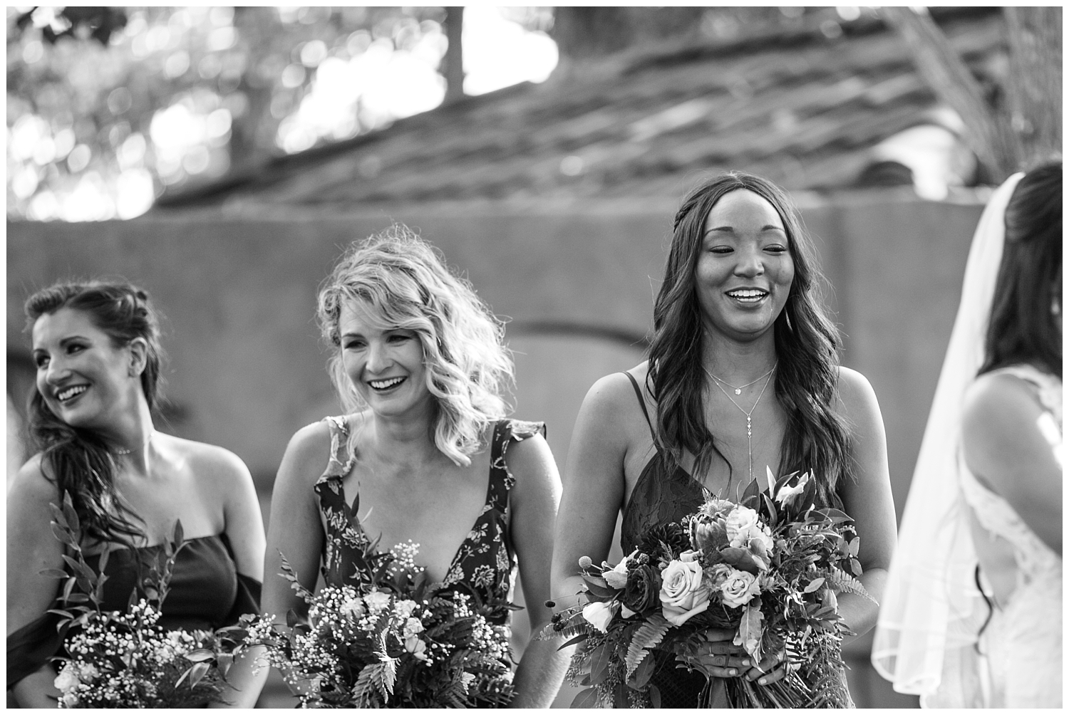 bridesmaids laughing and crying at Casa Rondena Winery wedding ceremony in Albuquerque, New Mexico