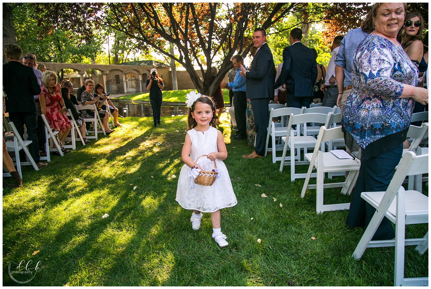 flower girl coming down the aisle of Casa Rondena Wedding