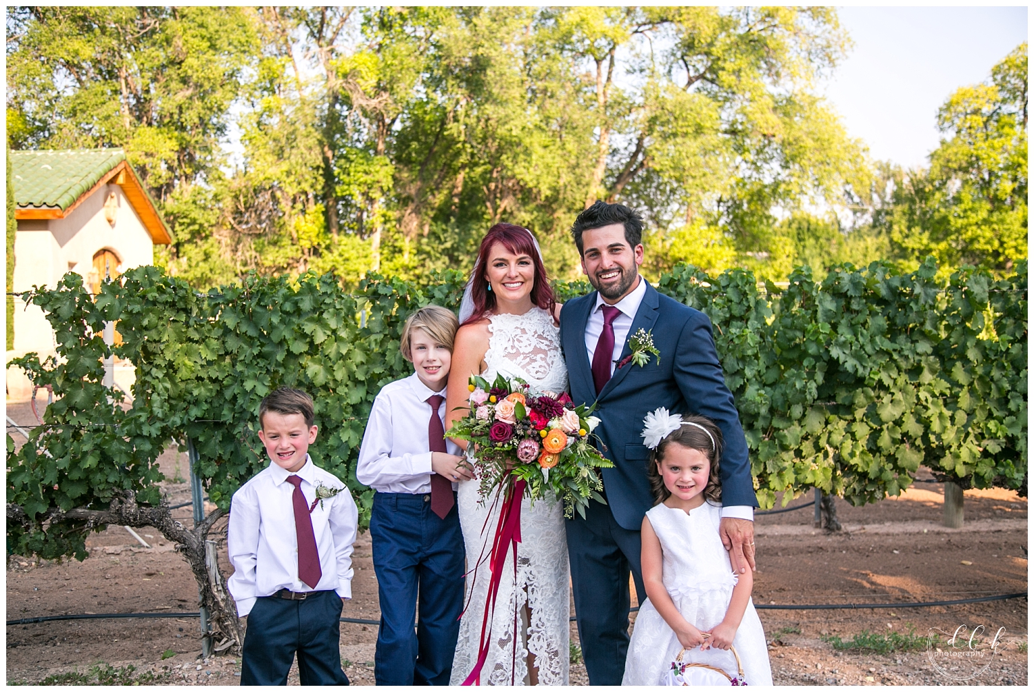 bride and groom with flower girl and ring bearers at Casa Rondena Winery wedding