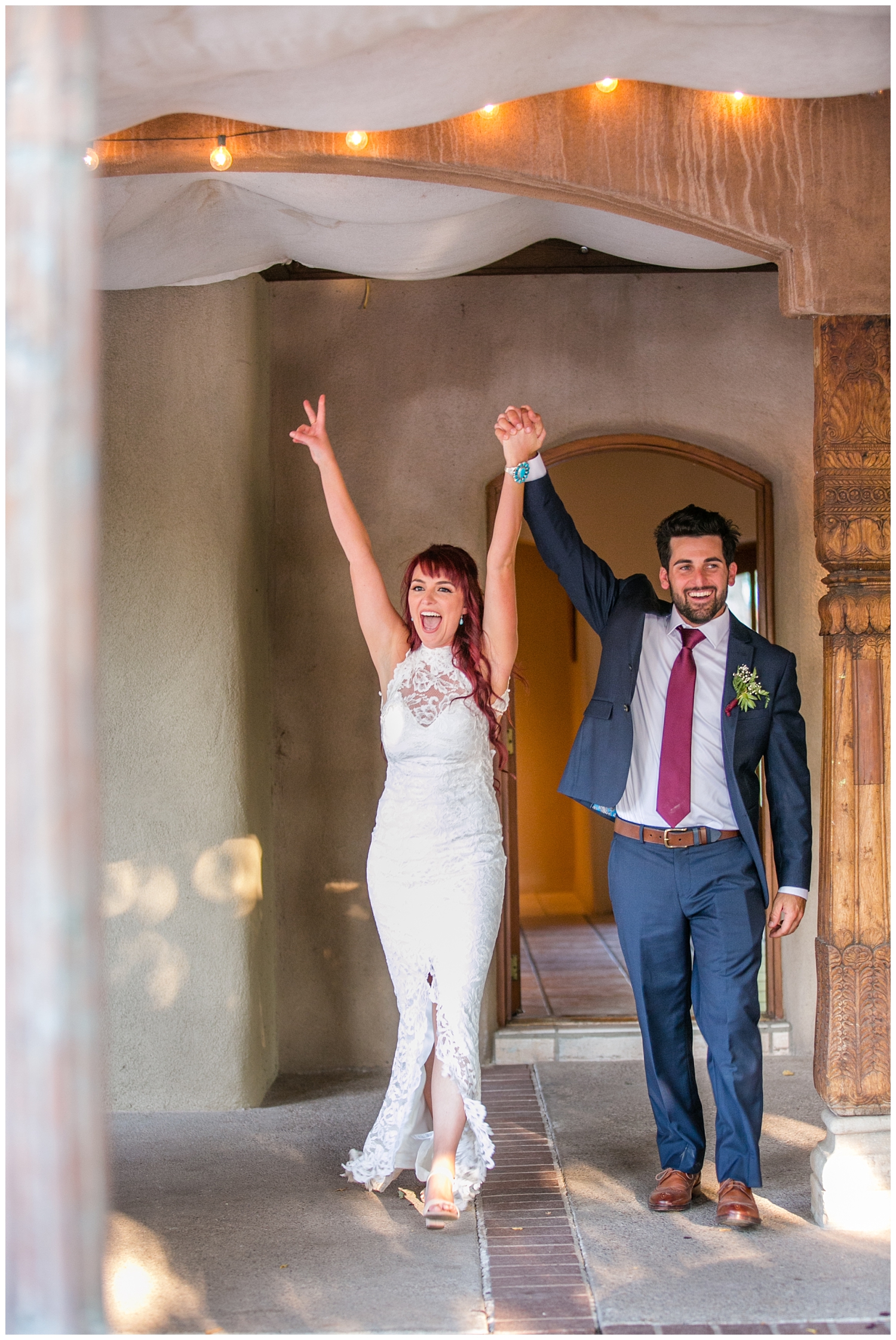 bride and groom cheering entering reception at Casa Rondena Winery wedding