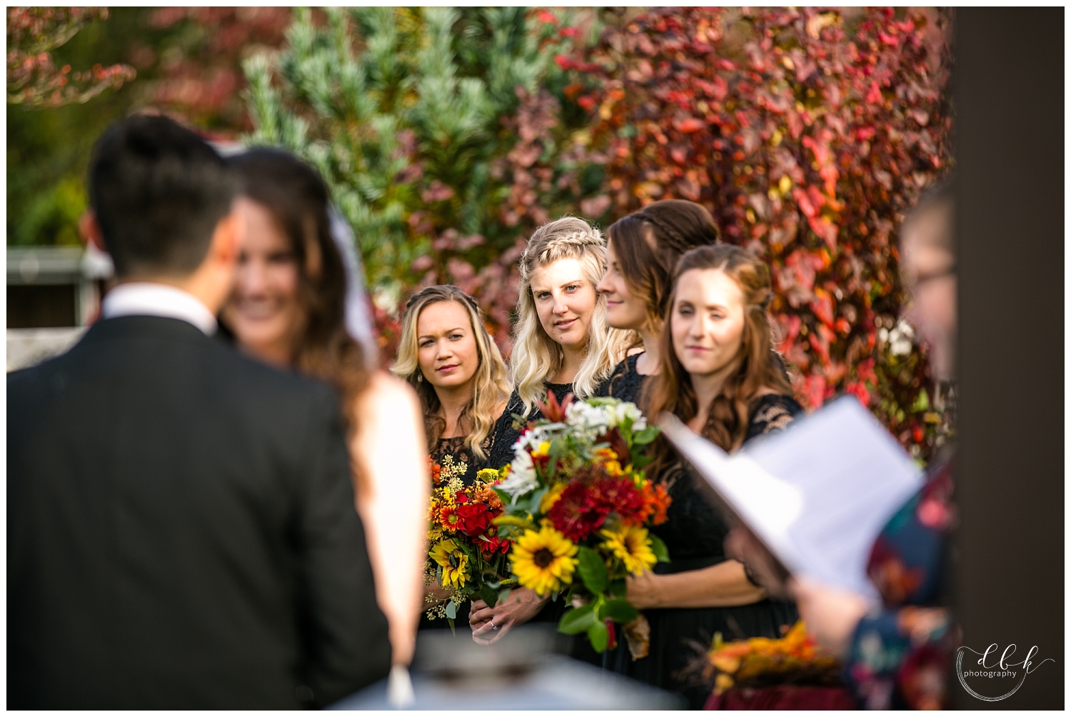 bridesmaids at fall wedding ceremony at Filigree Farm in Buckley, Washington