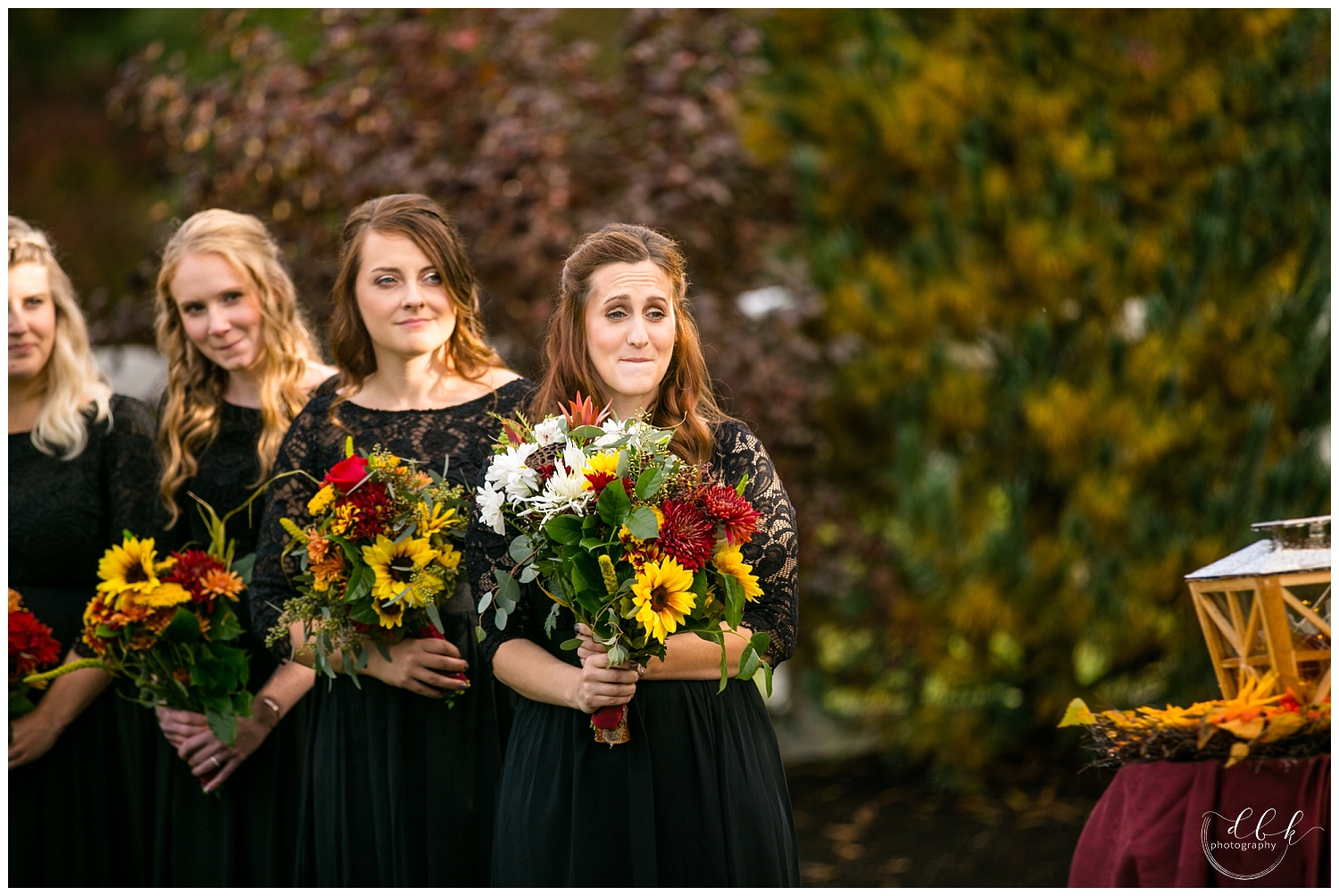 emotional bridesmaids at fall wedding ceremony at Filigree Farm in Buckley, Washington