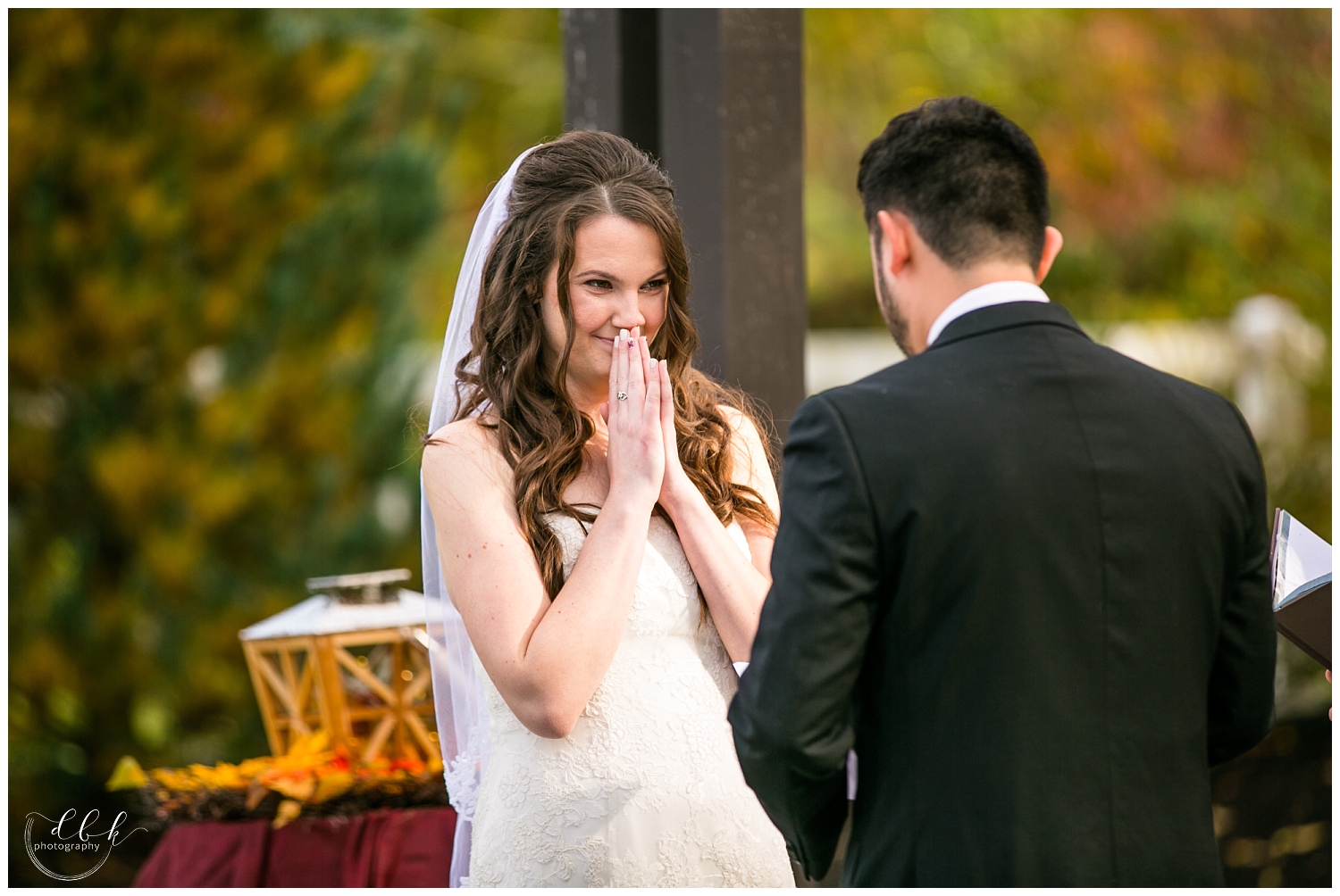 bride gets emotional at fall wedding ceremony at Filigree Farm in Buckley, Washington
