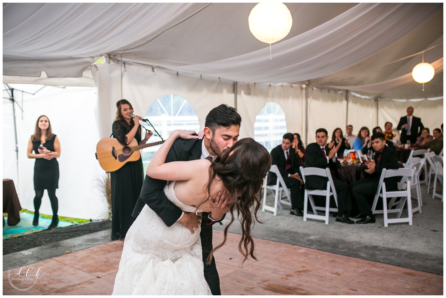 bride and groom have first dance at fall Filigree Farm wedding reception
