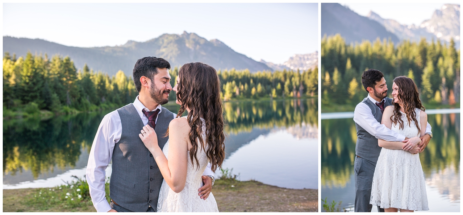 couple nuzzling noses by the water at Gold Creek Pond
