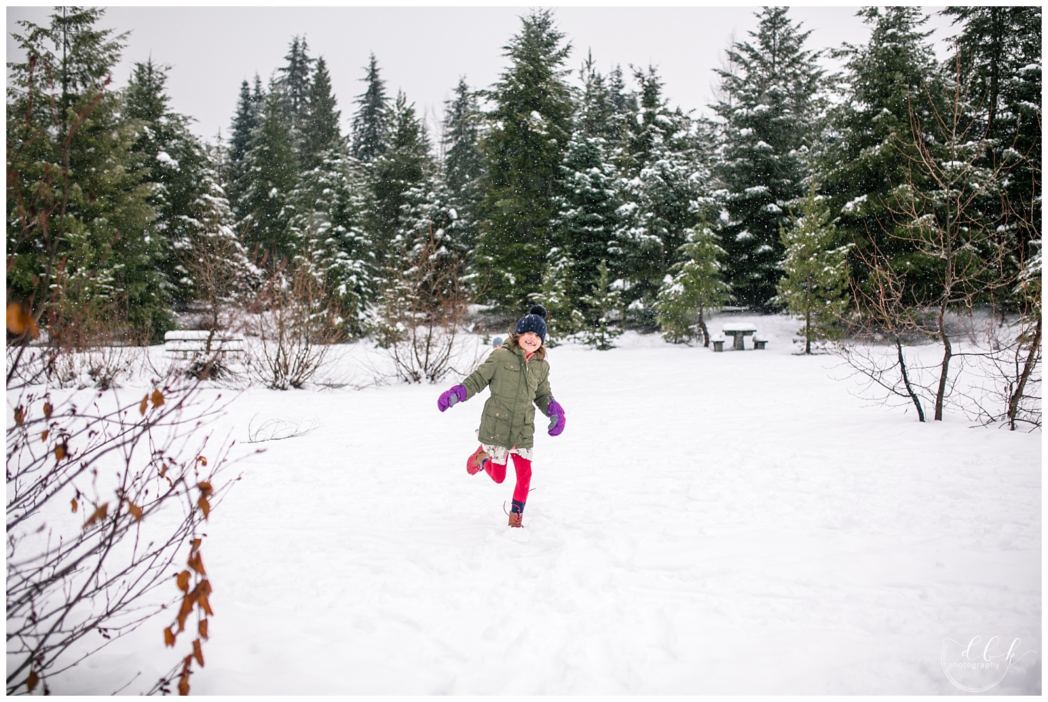 kids running around in the snow at Gold Creek Pond, Washington