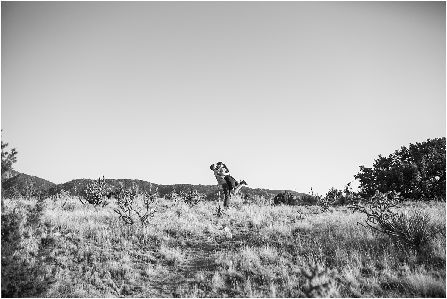 Sandia foothills engagement portraits at sunset in Albuquerque, New Mexico | Albuquerque wedding photographer