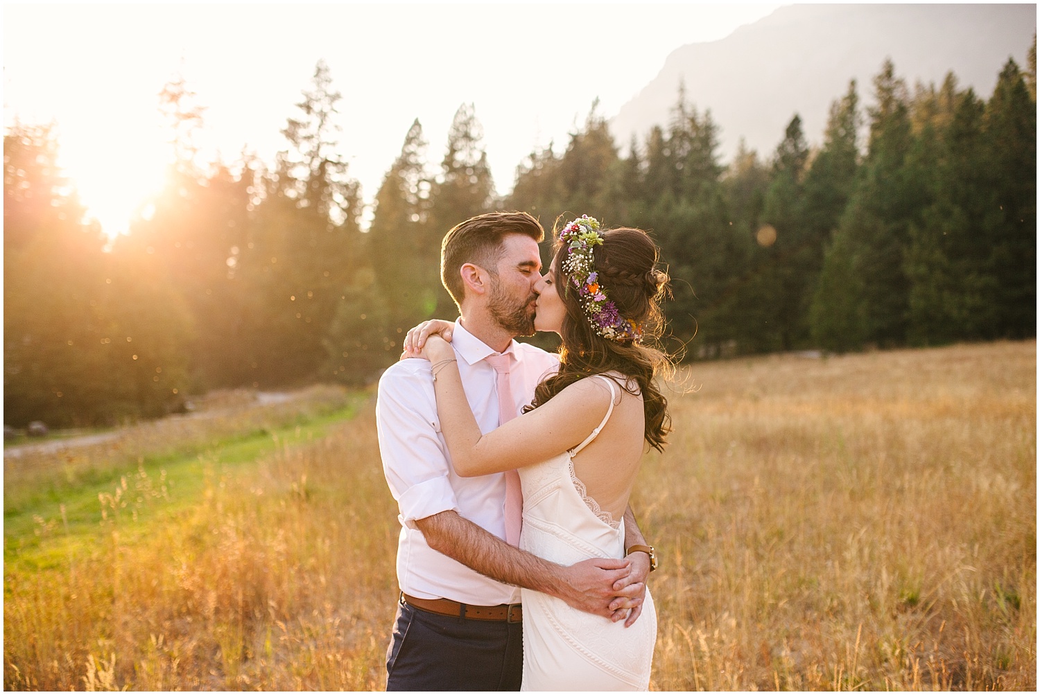 Boho chic bride and groom golden hour portraits at summer Brown Family Homestead wedding