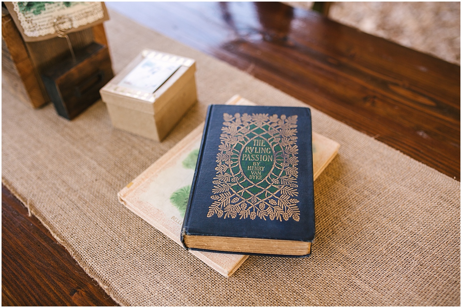 Antique books for wedding centerpieces at rustic chic Brown Family Homesteady wedding