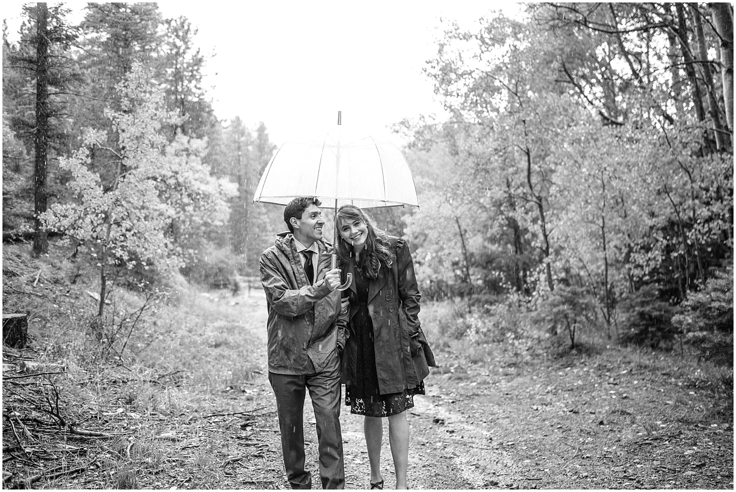 Santa Fe mountain engagement photos on a rainy fall day