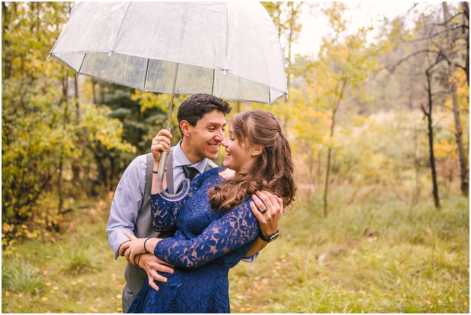 Santa Fe mountain engagement photos on a rainy fall day