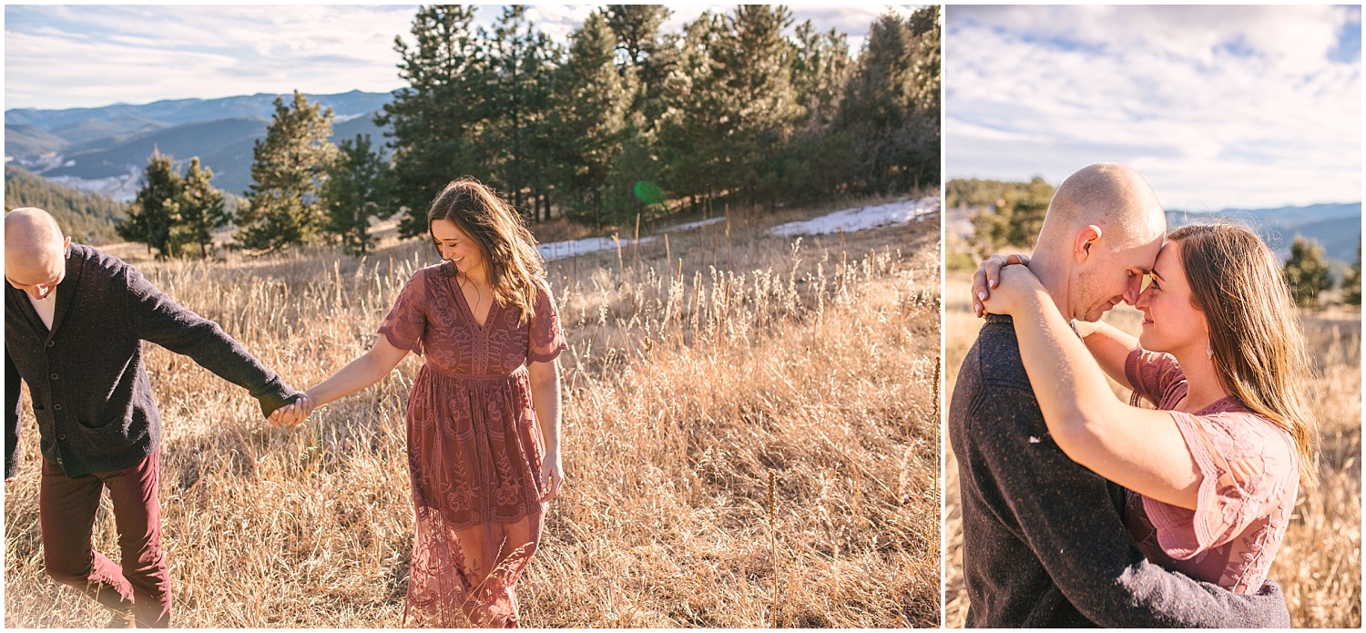 Couple walking in a tall grassy field for Mount Falcon engagement photos.