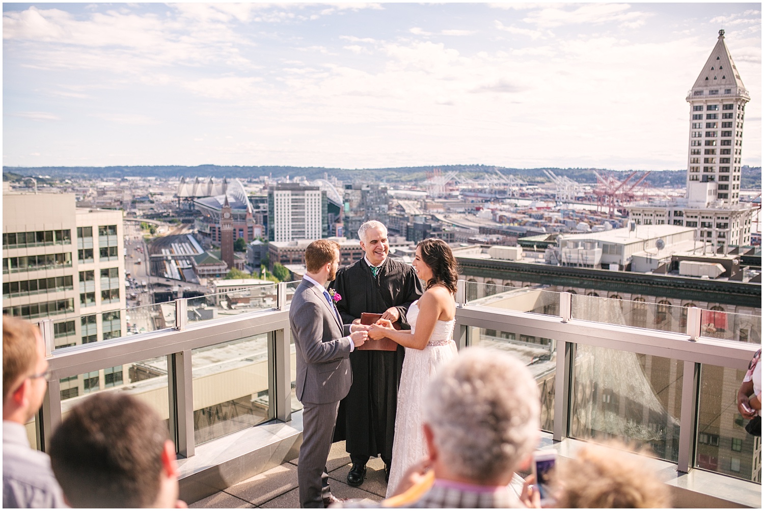 Seattle Municipal Court wedding ceremony on the rooftop, with a view of downtown Seattle.