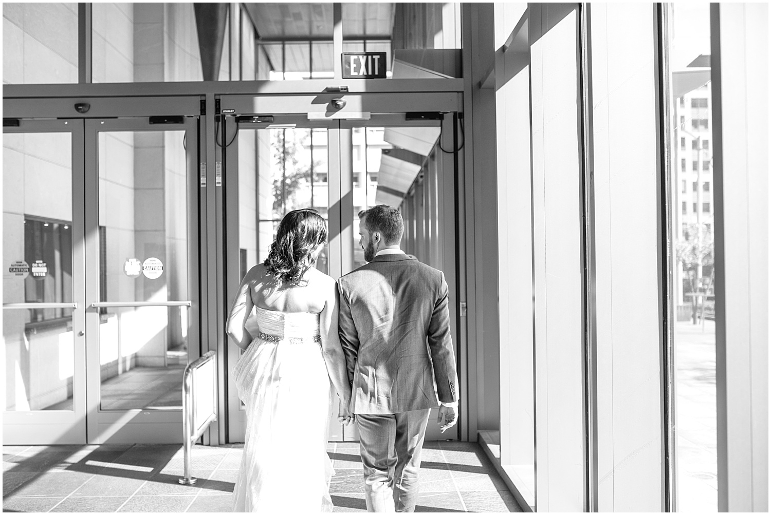 Bride and groom exiting Seattle Municipal Court wedding