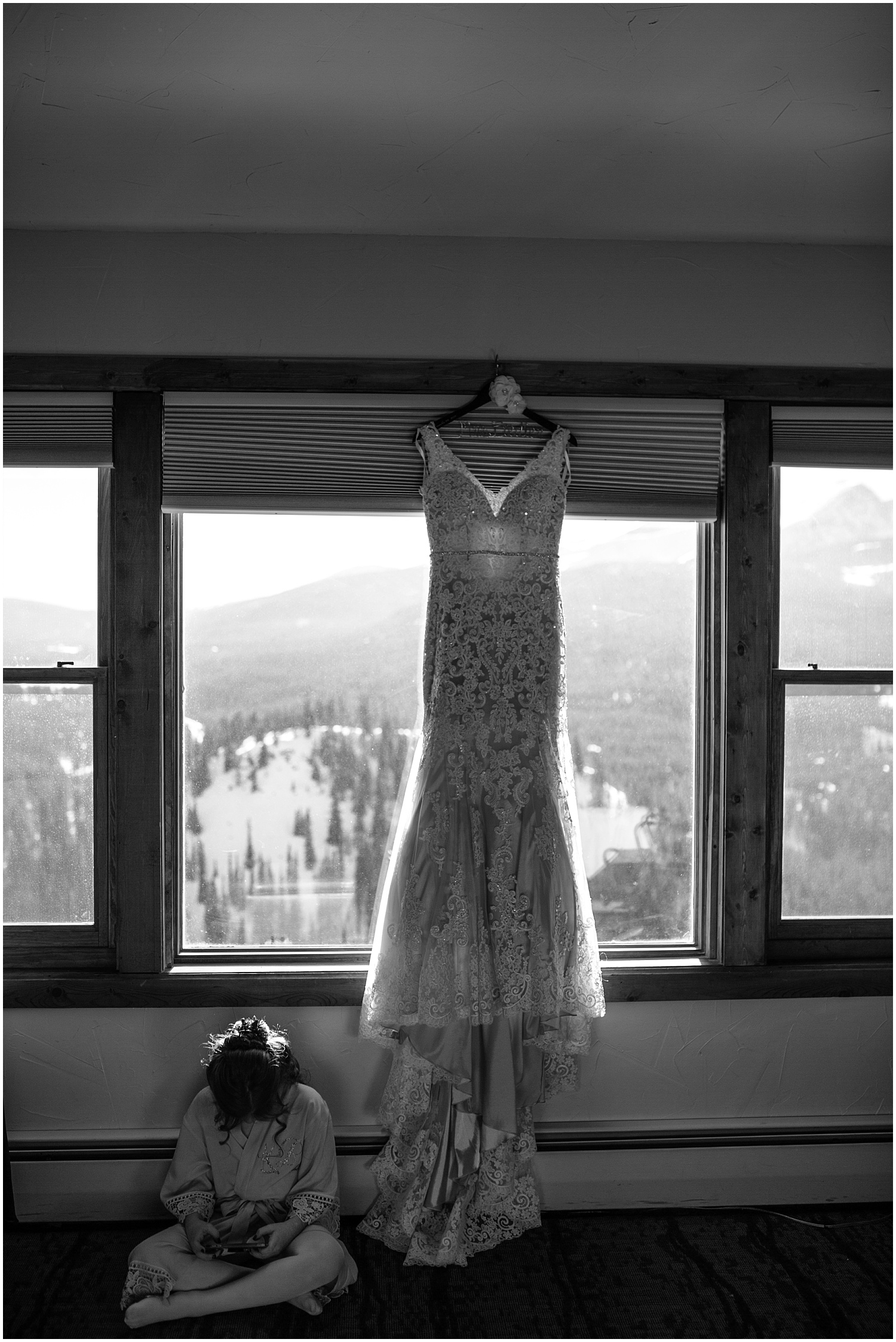 wedding dress hanging at The Lodge at Breckenridge winter wedding