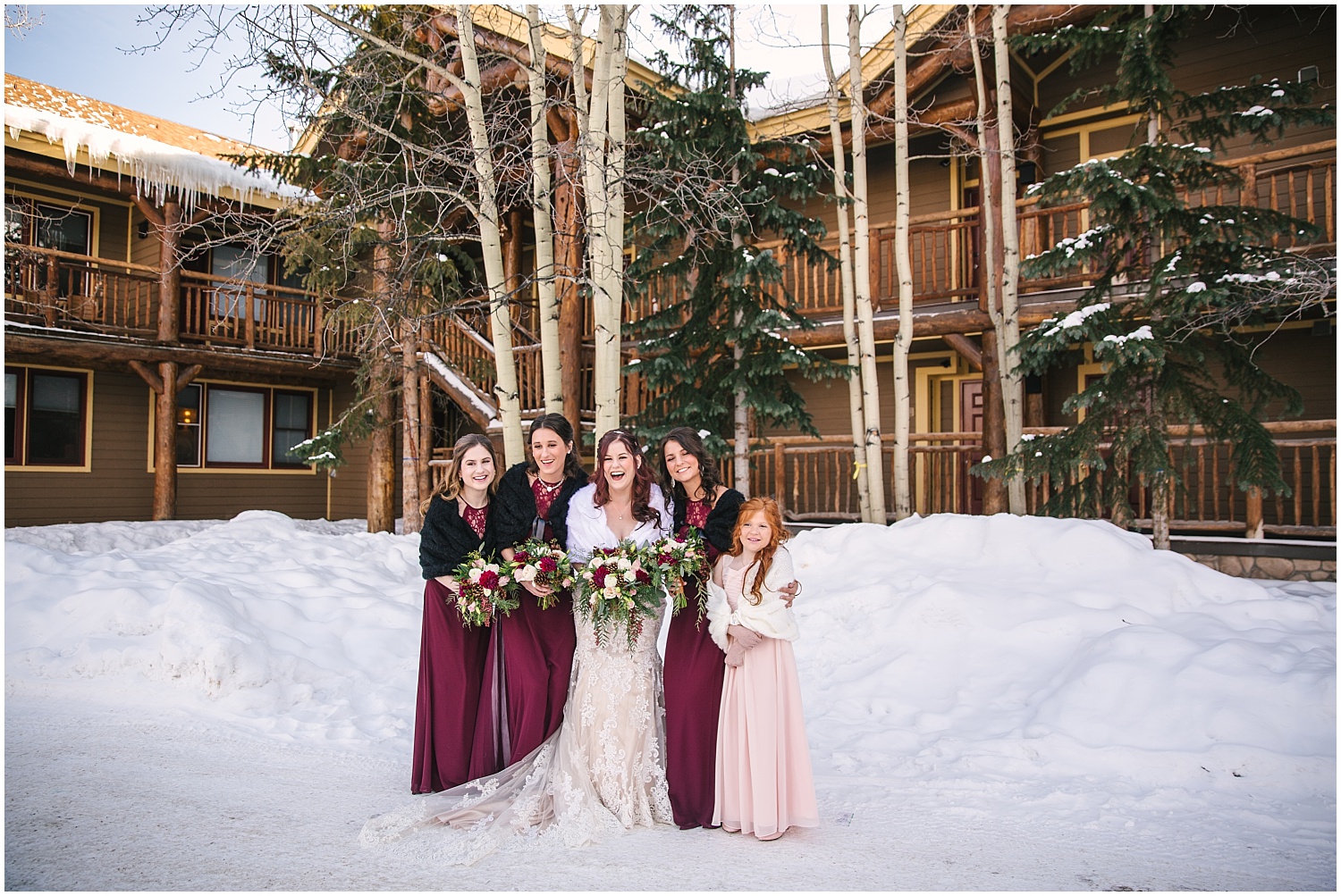 bridesmaids in the snow at The Lodge at Breckenridge winter wedding