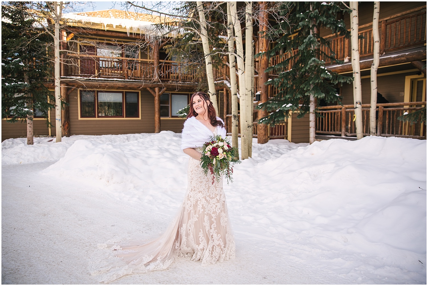 bridal portraits in the snow at The Lodge at Breckenridge winter wedding
