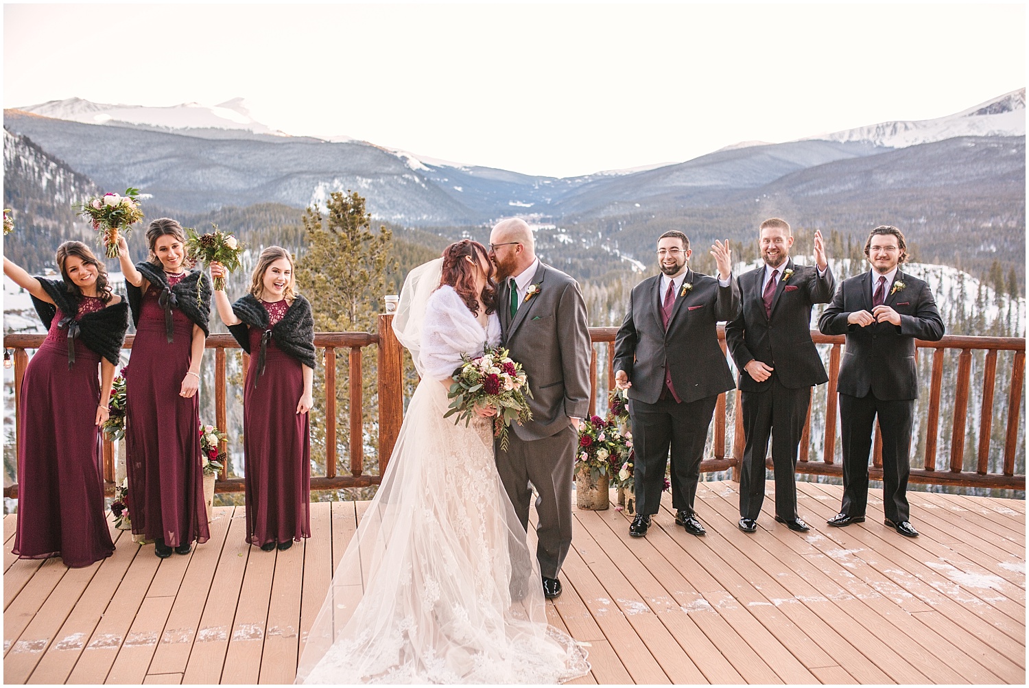 wedding party pictures on the deck at The Lodge at Breckenridge winter wedding