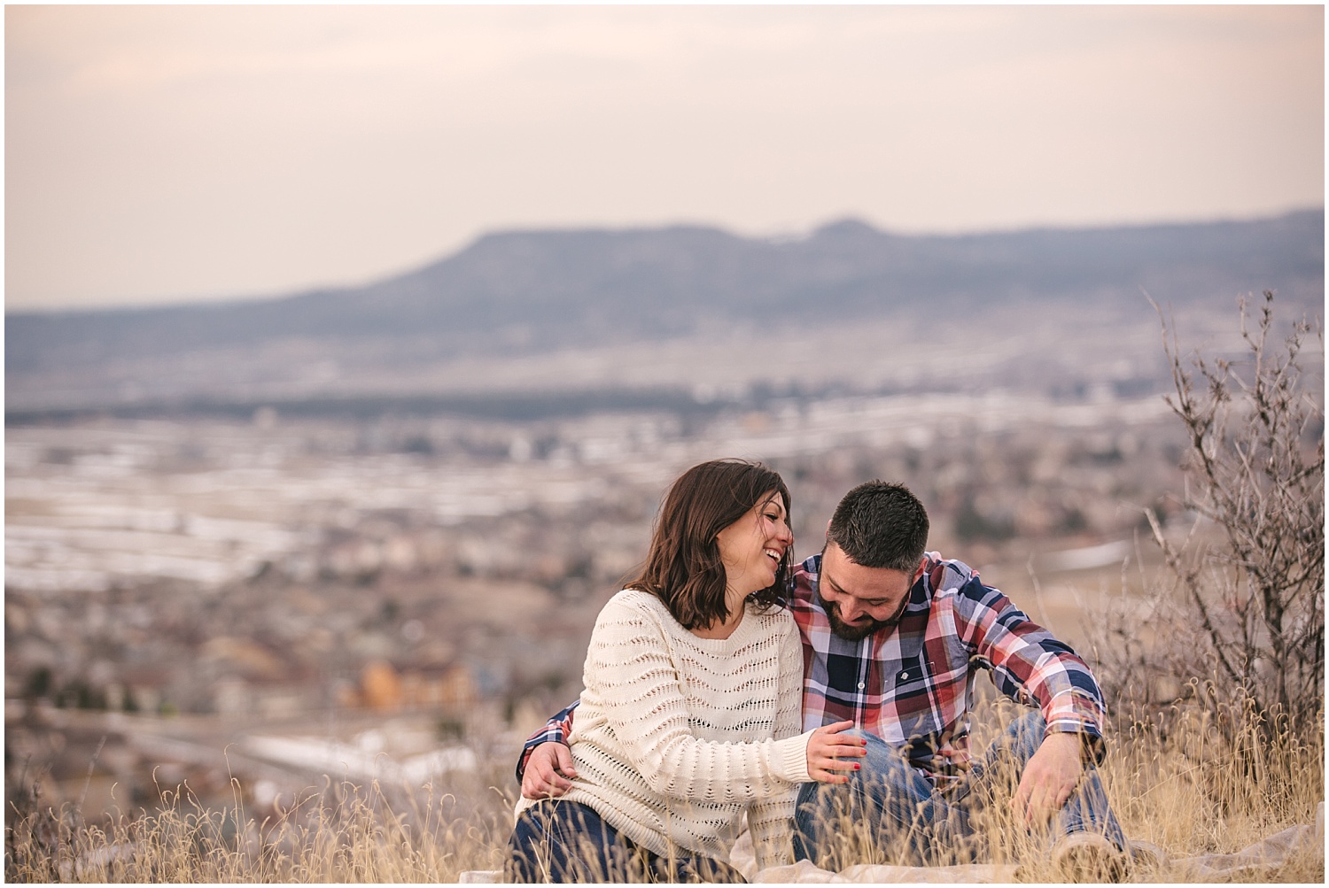 Castle Rock Colorado engagement photos with mountain views at sunset.