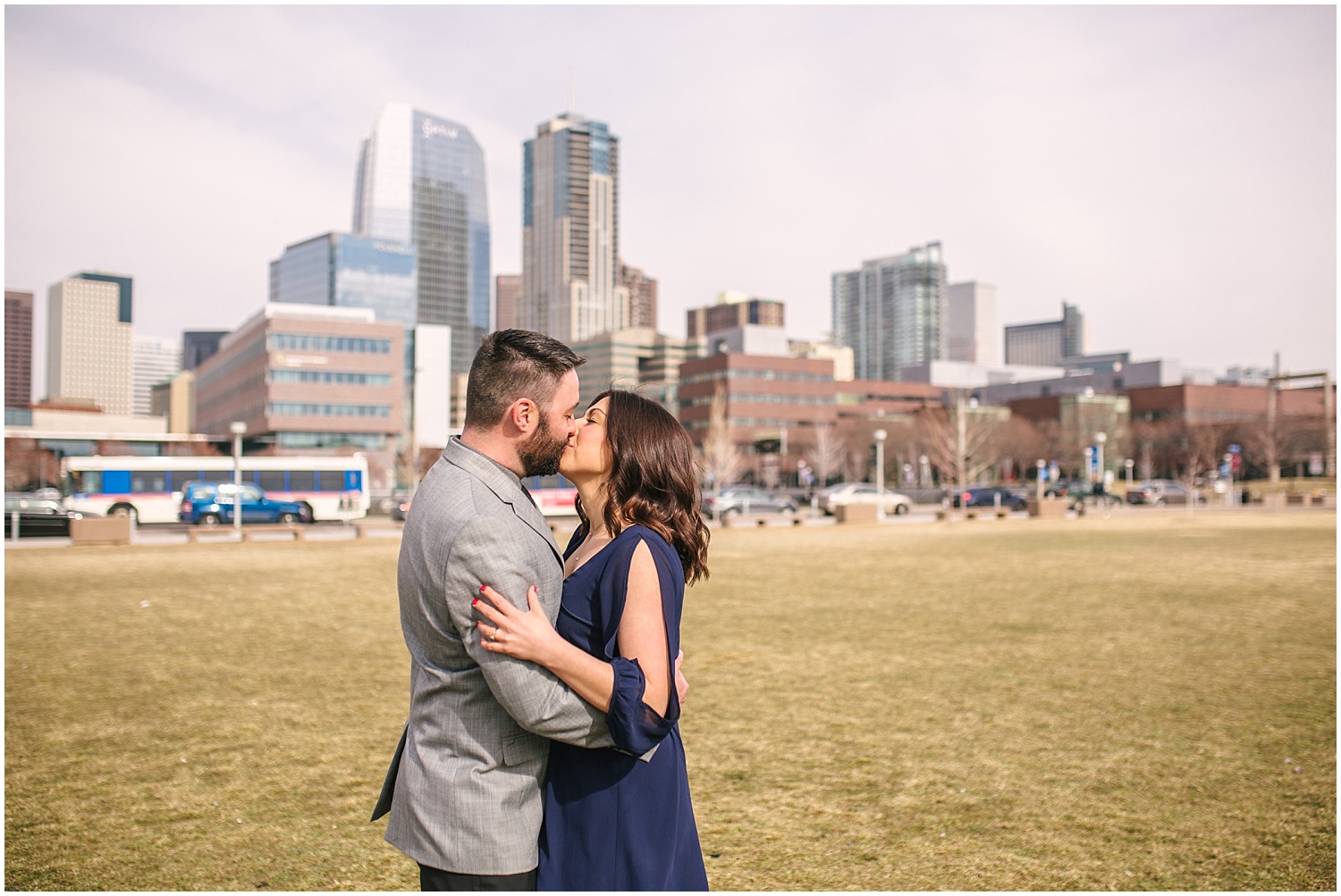 Downtown Denver engagement photos on the Tivoli quad overlooking the city.