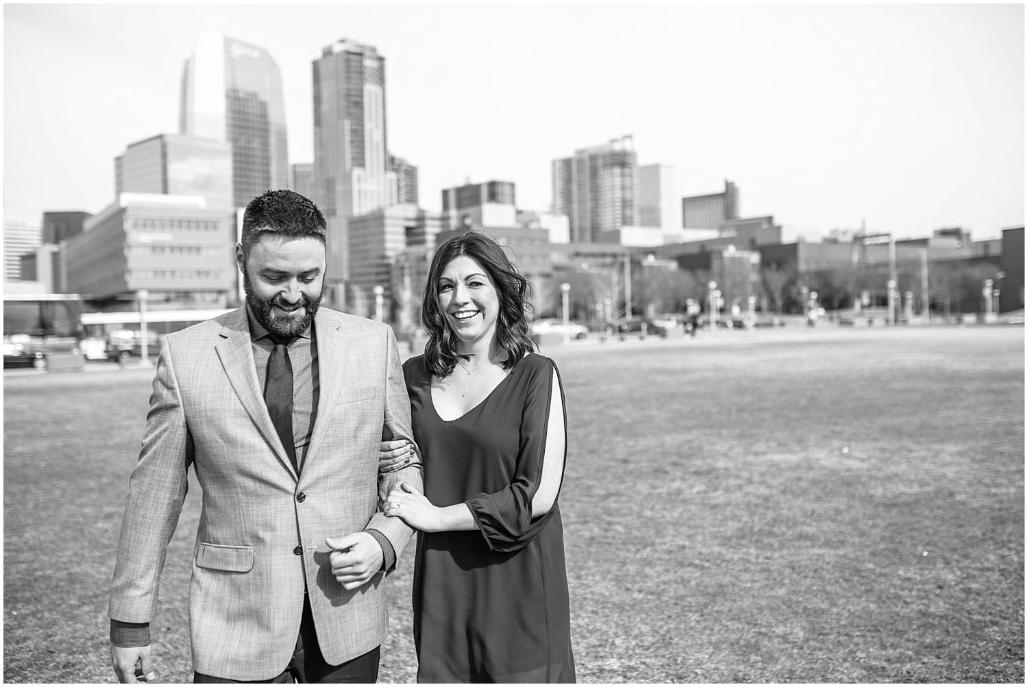 Downtown Denver engagement photos on the Tivoli quad overlooking the city.