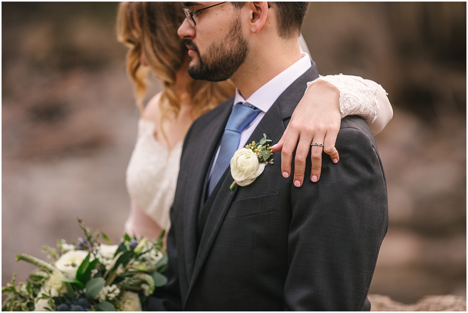 Bride's hand on groom's shoulder at Wedgewood Weddings Boulder Creek
