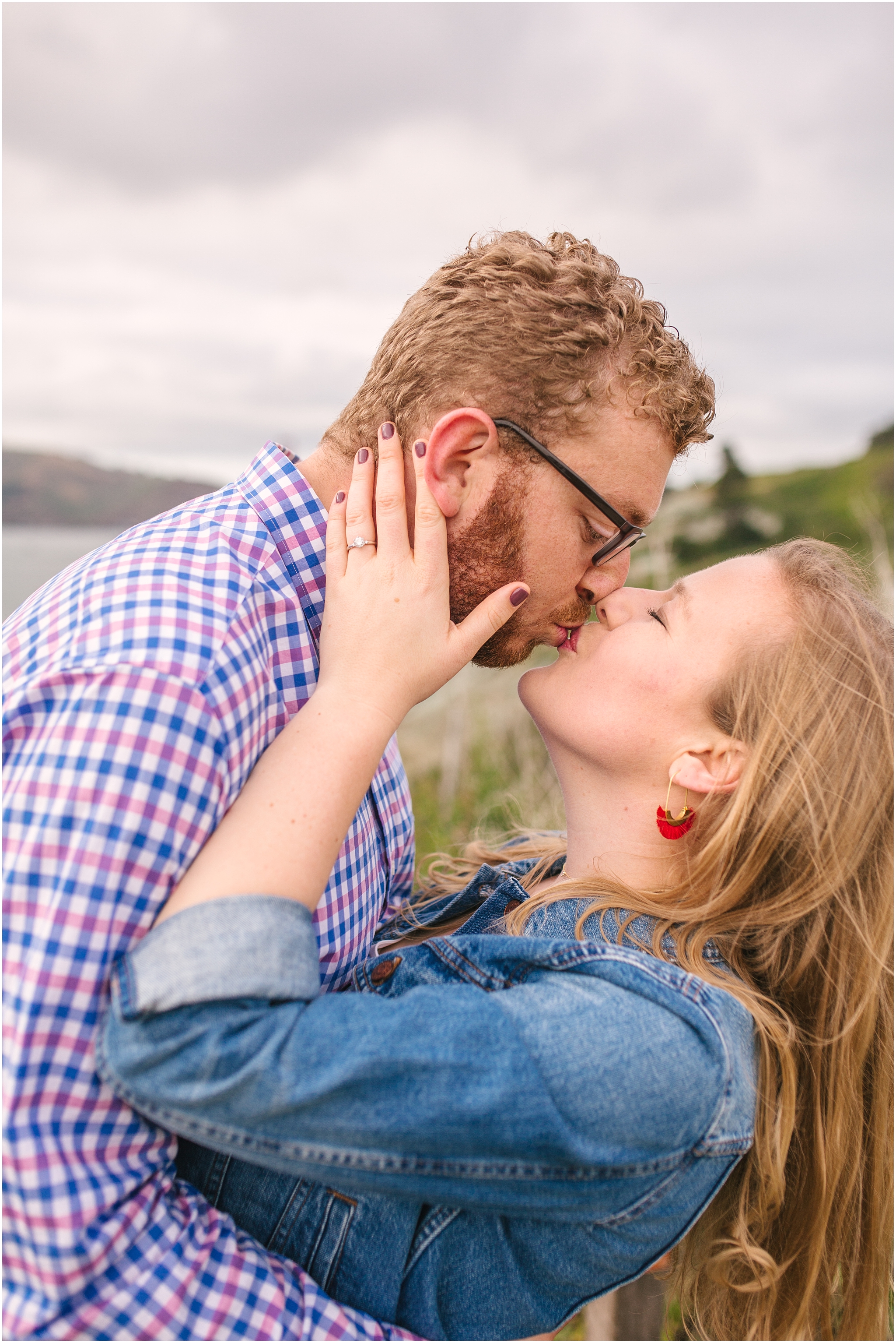 Couple kissing passionately - Marshall Beach San Francisco engagement pictures