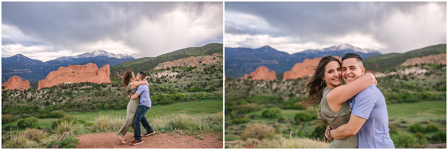 Couple kissing overlooking Garden of the Gods and Pikes Peak in Colorado Springs engagement photos