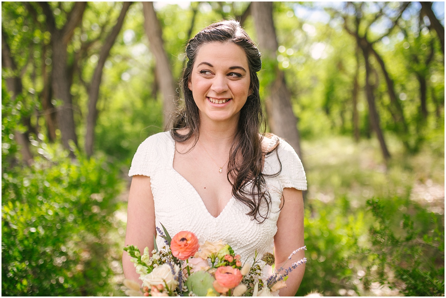 Bride with southwestern peony and cactus bouquet by Floriography Flowers at Hyatt Regency Tamaya wedding in New Mexico