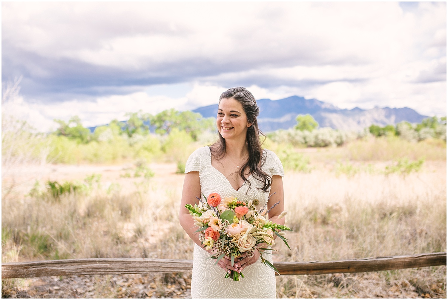 Bride in front of Sandia Mountains at Hyatt Regency Tamaya wedding in New Mexico