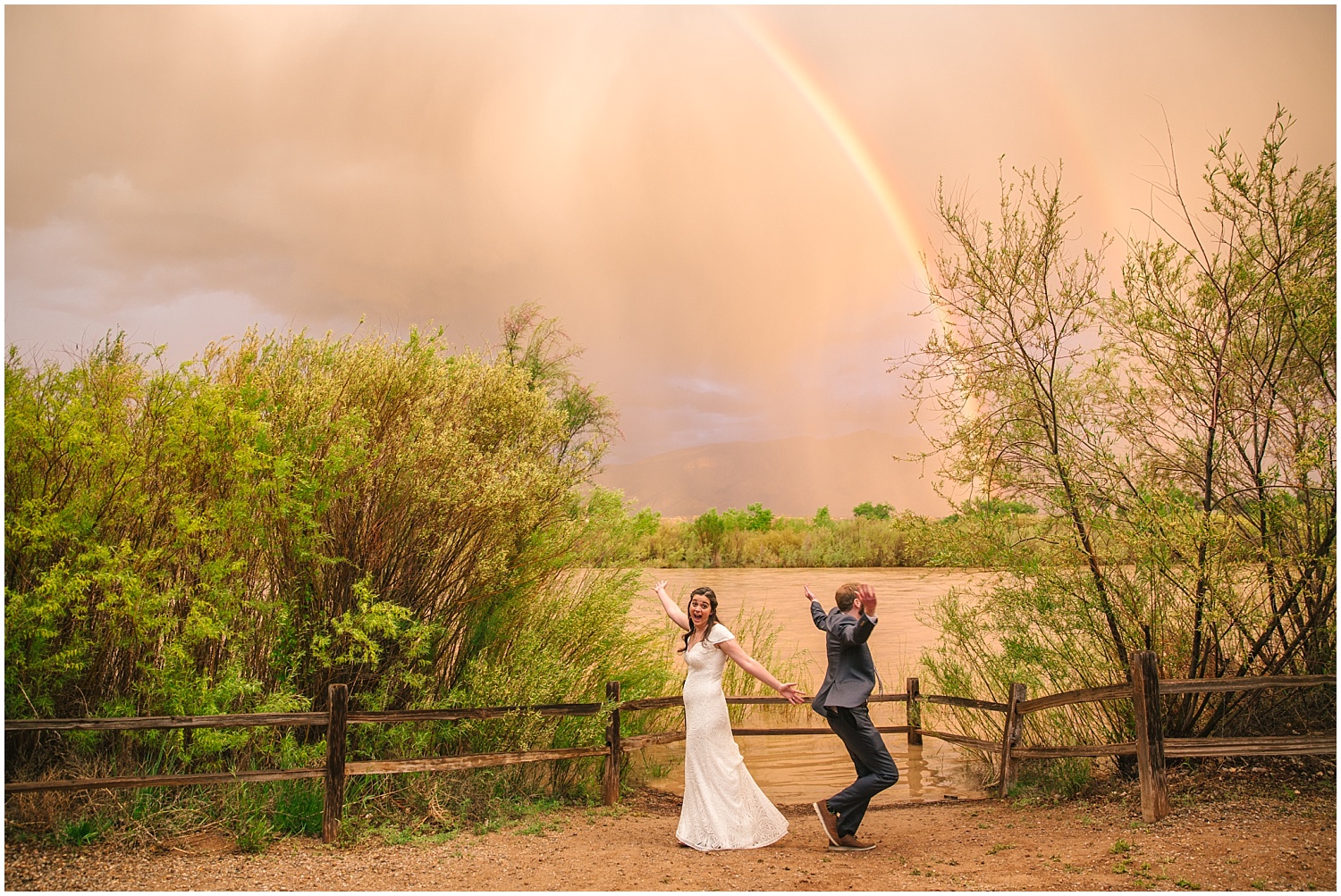 Double rainbow over dancing bride and groom at Hyatt Regency Tamaya wedding in New Mexico