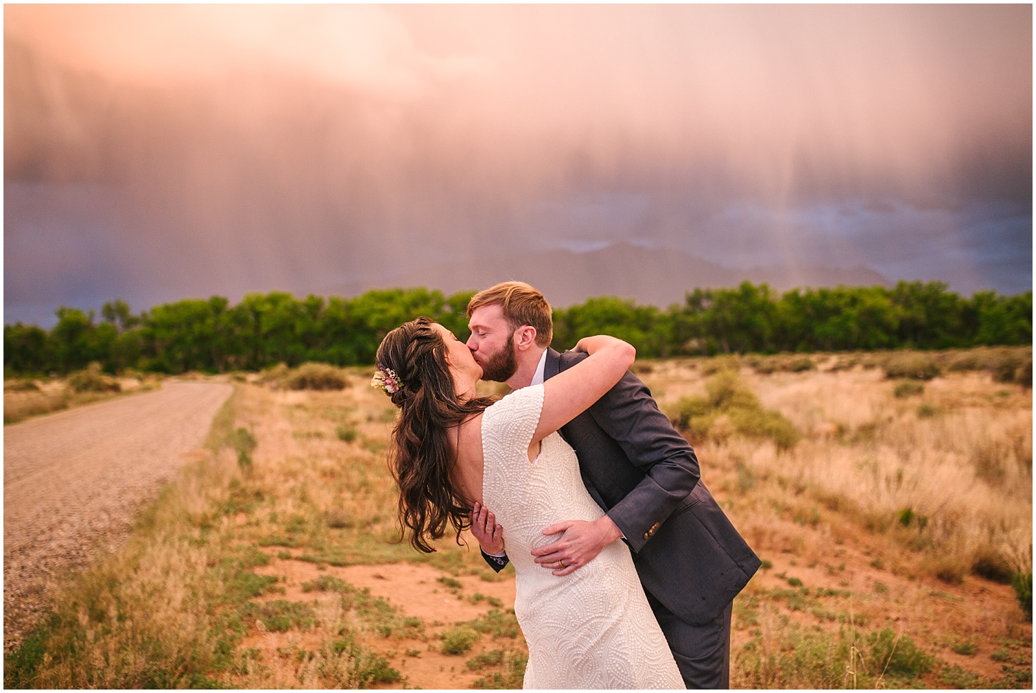 Bride and groom sunset portraits after summer storm at Hyatt Regency Tamaya wedding in New Mexico