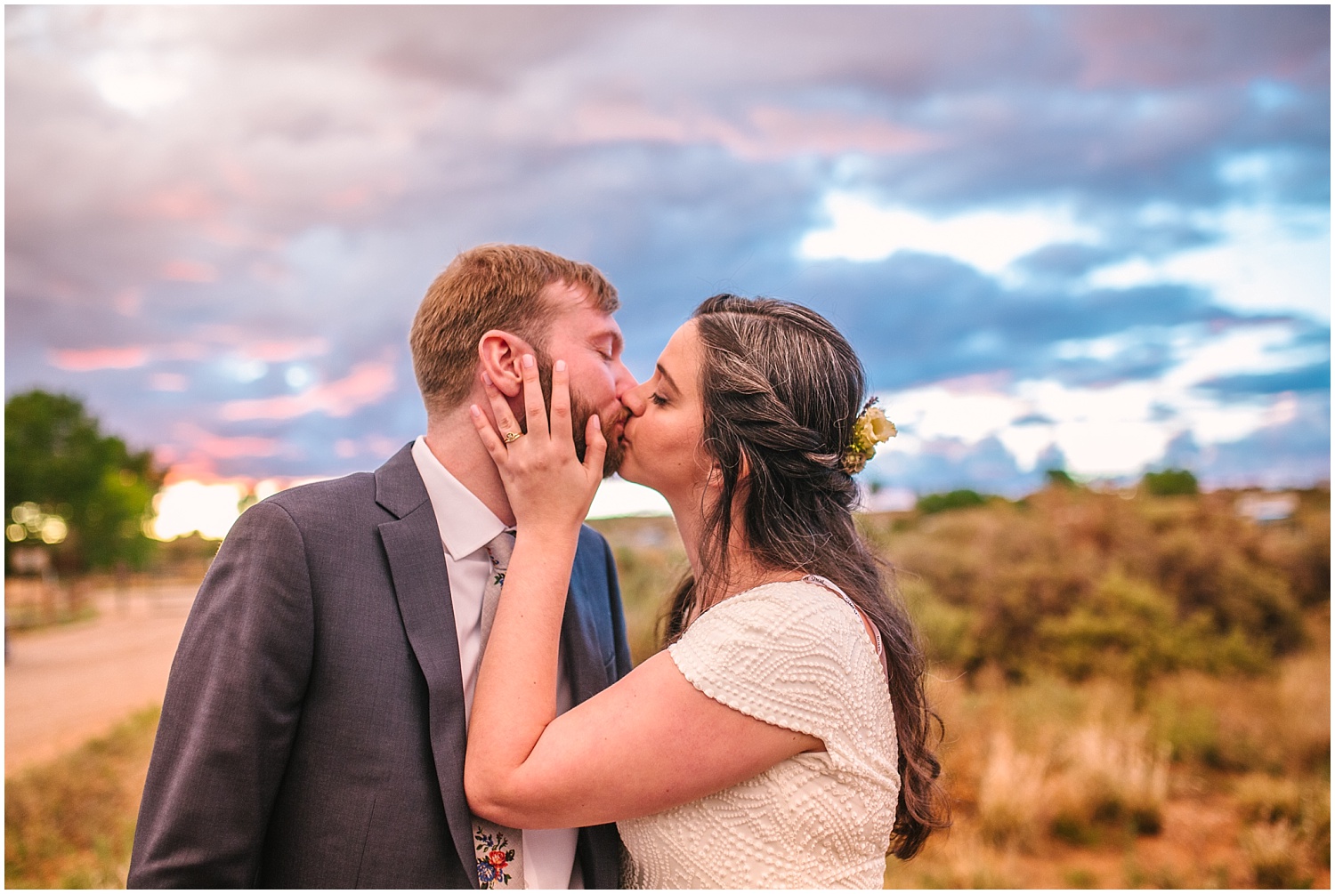 Bride and groom sunset portraits after summer storm at Hyatt Regency Tamaya wedding in New Mexico