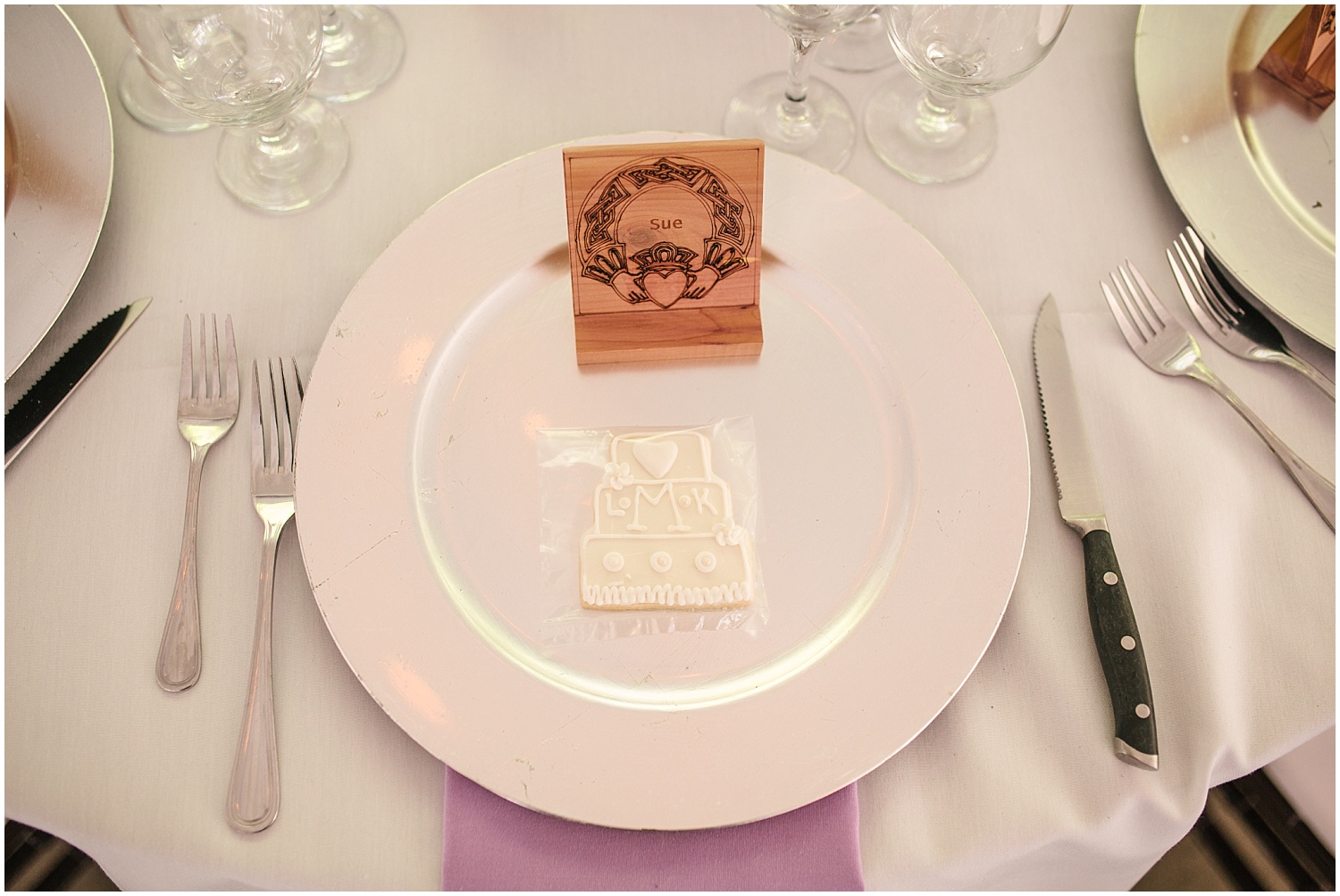 Jefferson Street Mansion wedding reception details featuring custom wood place cards
